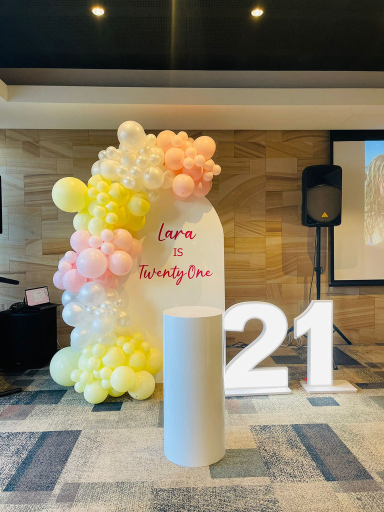 Personalised White Wooden Backdrop with balloon Garland LED lights and Plinth